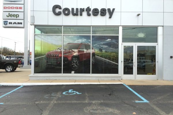 Window Graphics done for a car dealership of a full vehicle.